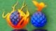 Two original Fruit Battlegrounds fruits.